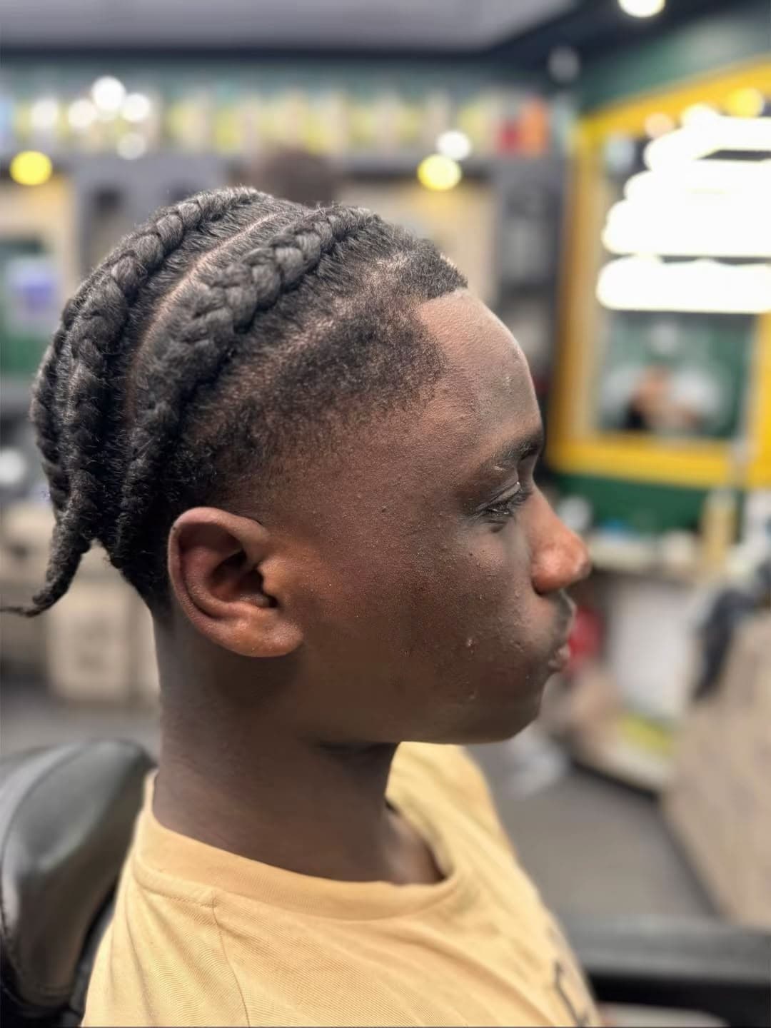 Frisch geflochtene Cornrows, Seitenansicht